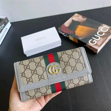 carteras farfetch